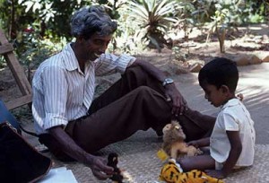 Sri-Lankan child with researcher
